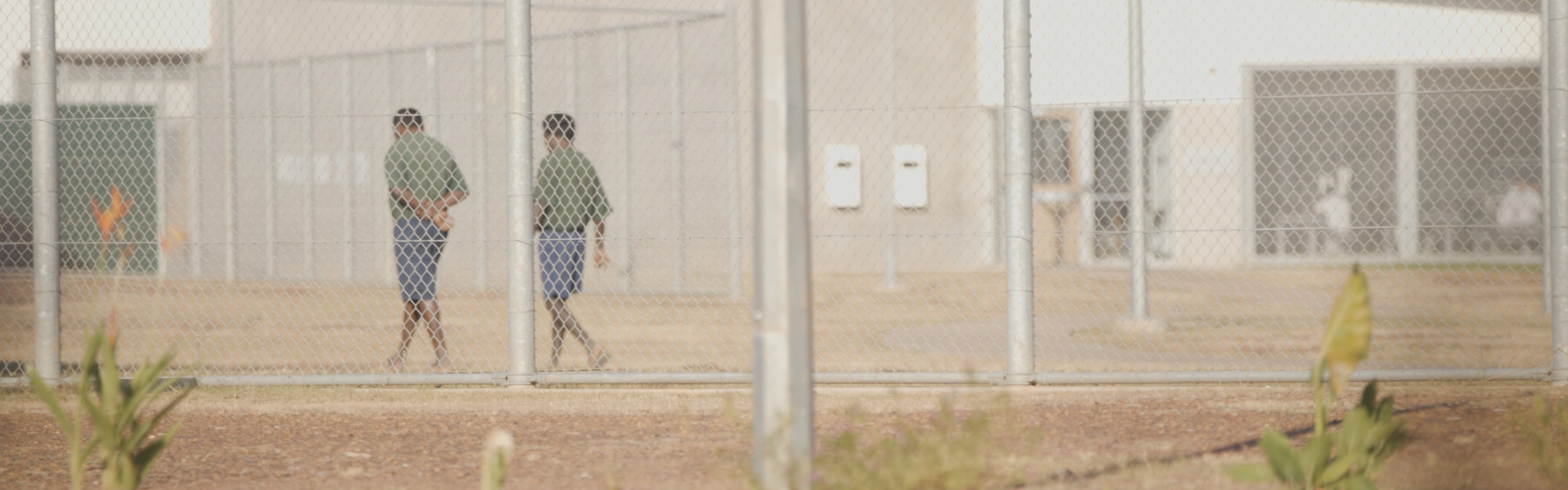 Prisoners walking in the distance